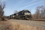 NS 4465 takes a manifest train down the siding